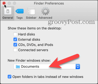 Click the New Finder windows show drop-down list in Finder Preferences on your Mac